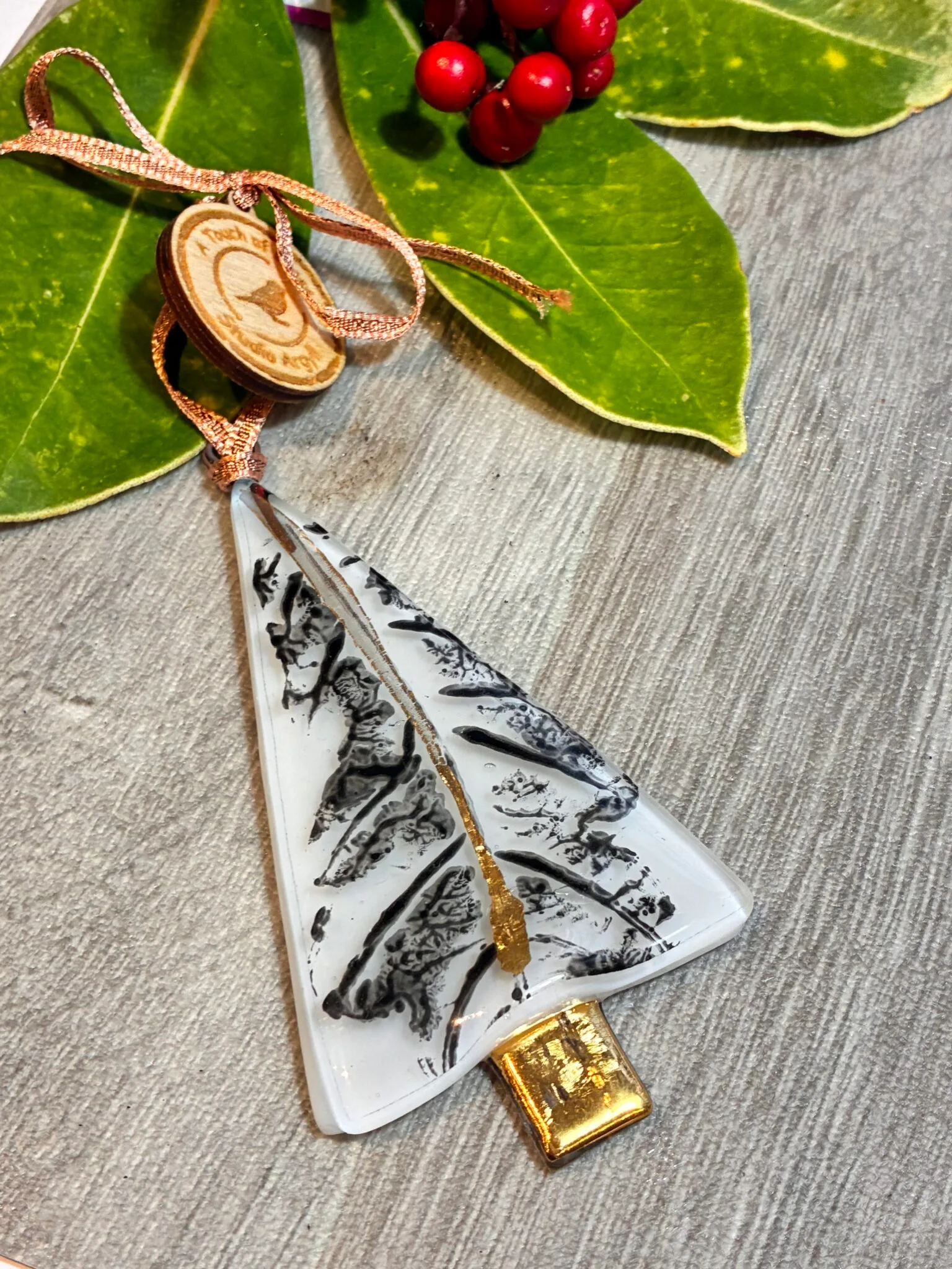 Fused glass christmas tree with printed Oak Leaf and gold trunk.